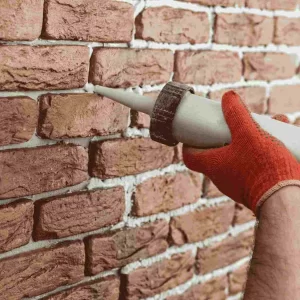 Grout or resin injection to a prepared building element