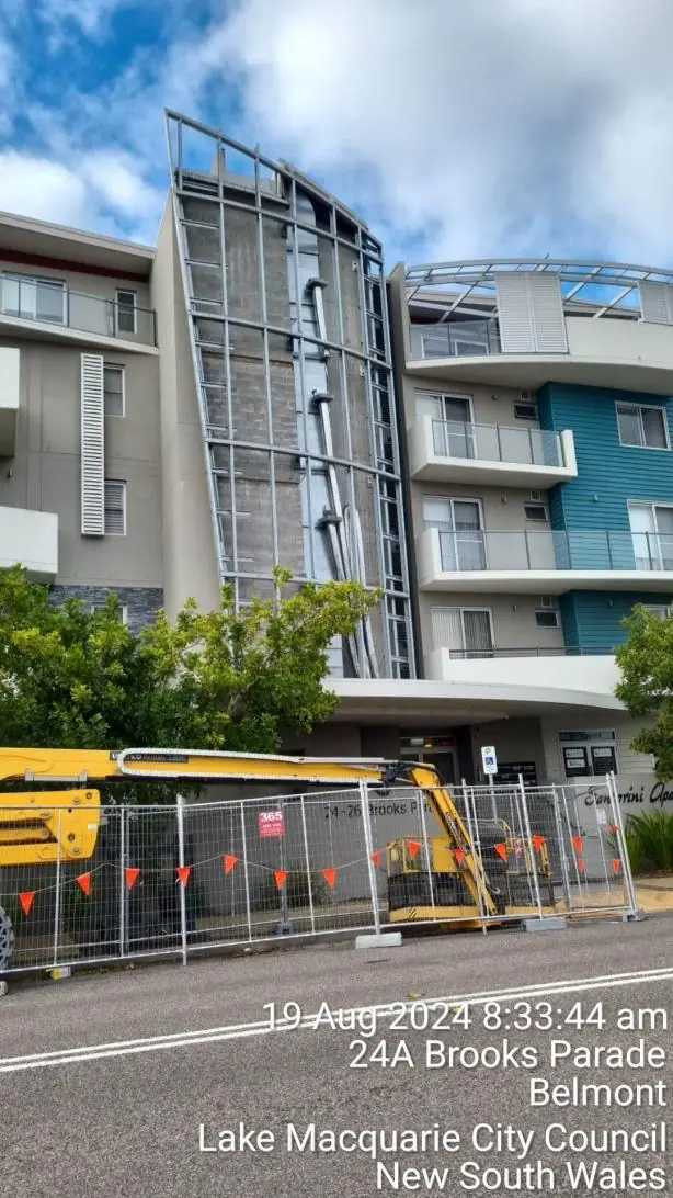 SCE recladding work exposing the façade support structure at Belmont NSW