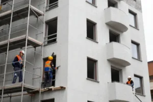 Apartment building façade with scaffolding during cladding replacement works in Sydney NSW