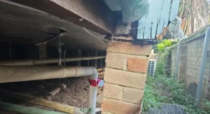 Damaged masonry pier at Currambena Preschool and Primary School in Lane Cove