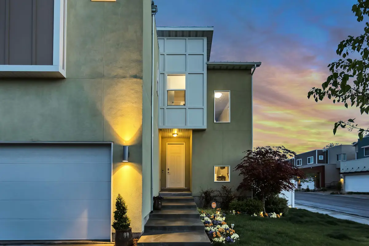 Modern residential building exterior for cladding and building envelope cost planning.