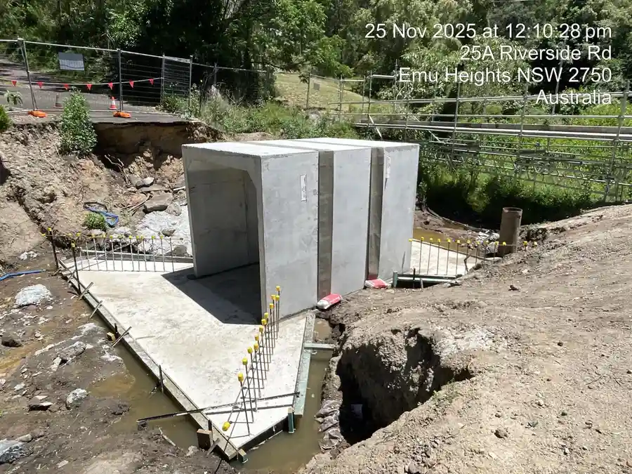 Twin precast box culverts installed with concrete aprons during bridge reconstruction in Emu Heights