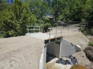Reconstructed bridge and box-culvert crossing after backfilling in Emu Heights