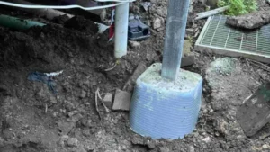 New permanent concrete footing and steel post installed during SCE remedial works in Lane Cove