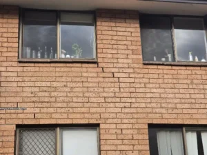 Stepped cracking across external brickwork at an occupied strata building in Surry Hills, NSW