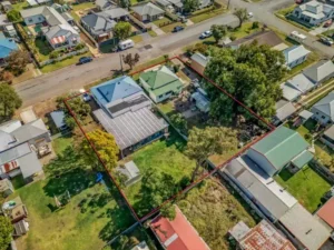 Oblique aerial view of 18 and 20 Harris Street, Cessnock, with the development site outlined in red