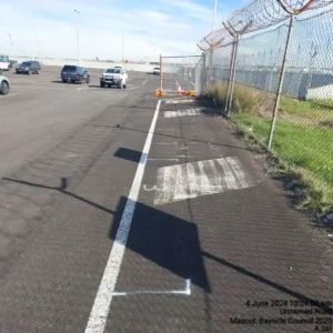 Marked concrete barrier placement positions at Sydney Airport Blue Emu Car Park.