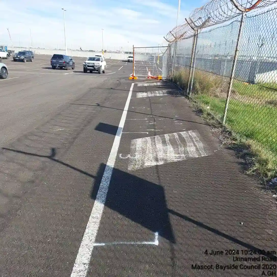 Marked concrete barrier placement positions at Sydney Airport Blue Emu Car Park.