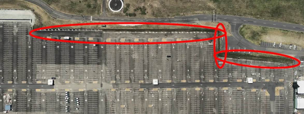 Aerial view with marked concrete barrier placement zones at Blue Emu Car Park.
