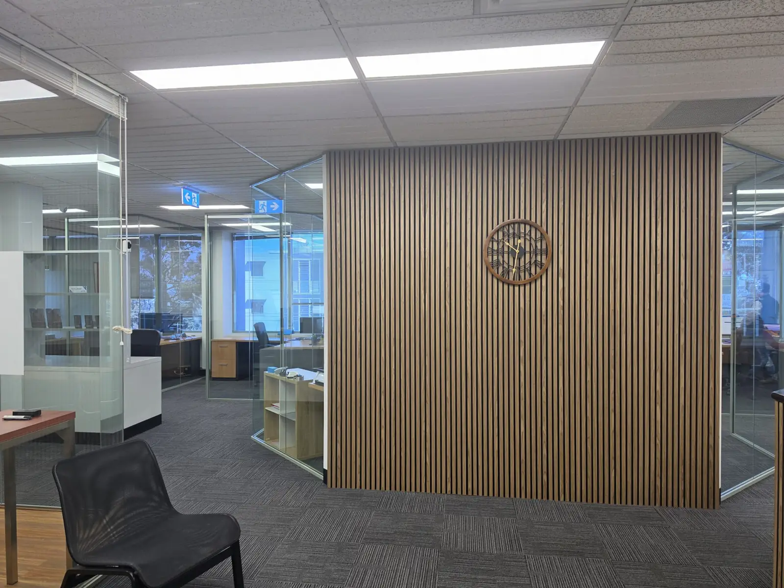 Completed Artarmon office entrance with decorative vertical cladding and glass partitions