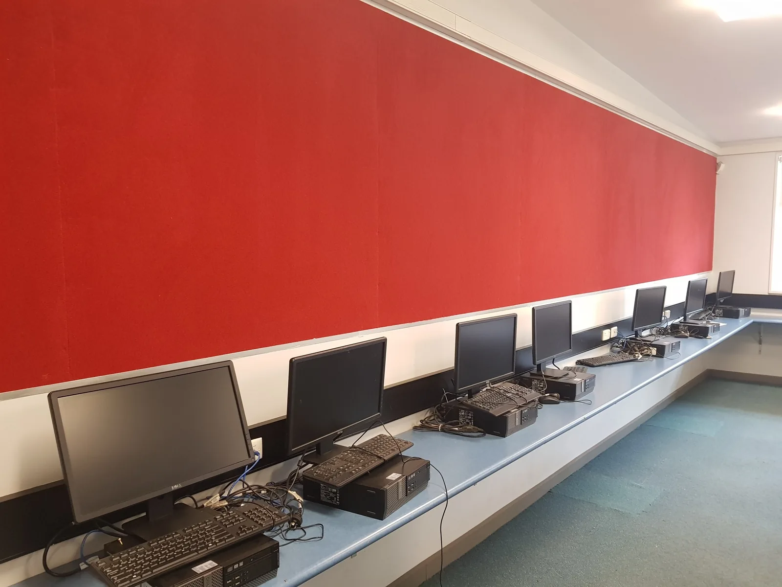 Refurbished computer classroom with red Autex acoustic panels at Cherrybrook Technology High School