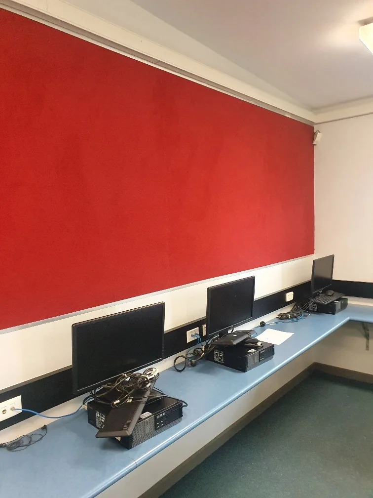 Autex acoustic wall panels behind existing classroom computers at Cherrybrook Technology High School