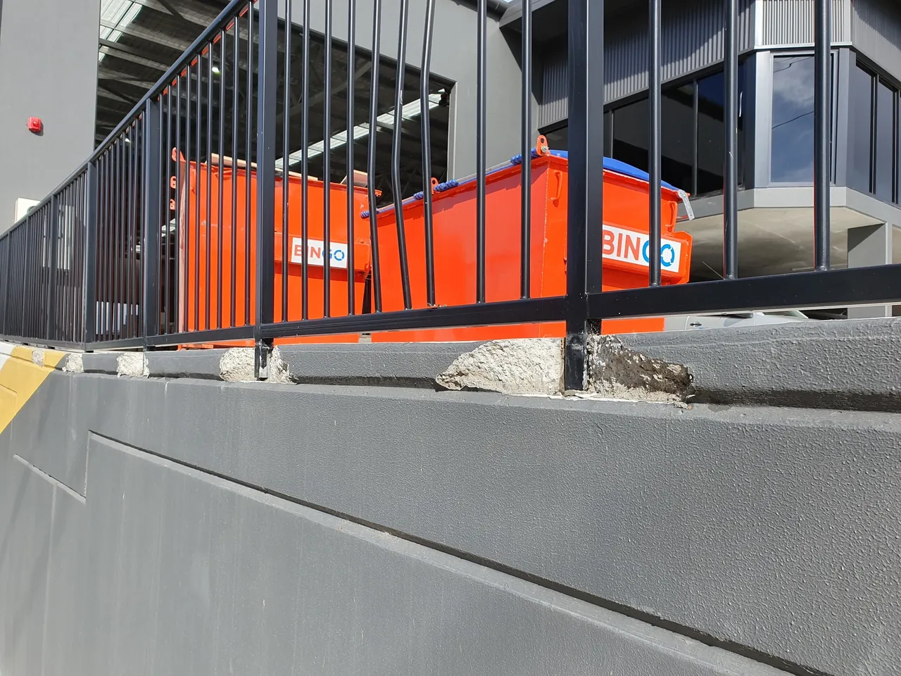 Damaged concrete around a balustrade post at the Mount Kuring Gai industrial complex